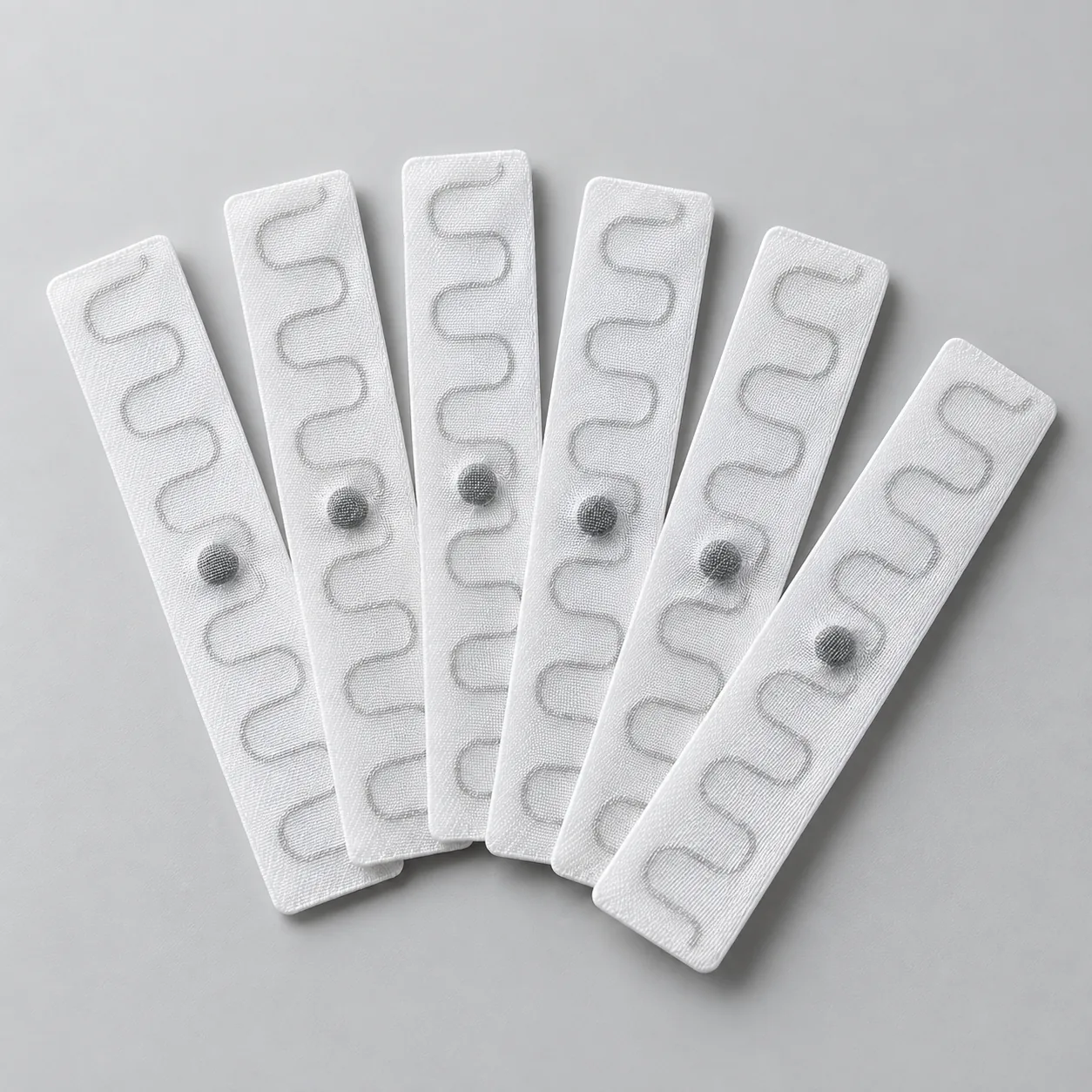 Foto 1 de 4 — Etiqueta RFID Têxtil para Lavanderia Industrial Vixcard — Vixcard